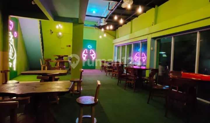 Two-story shop house, former cow shed