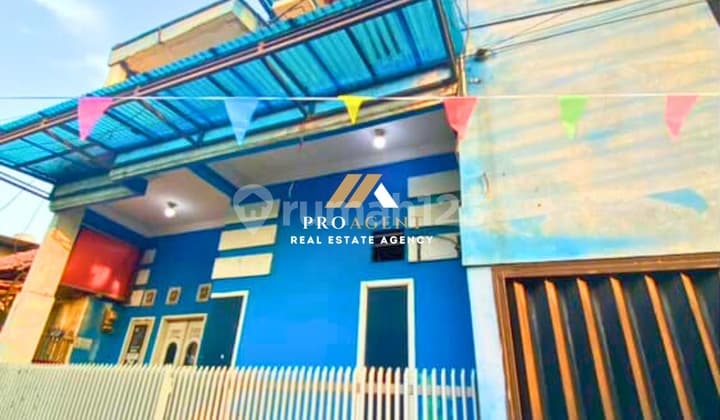 Rumah 2 Lantai lengkap dengan 2 Ruko - Strategis untuk Hunian & Investasi