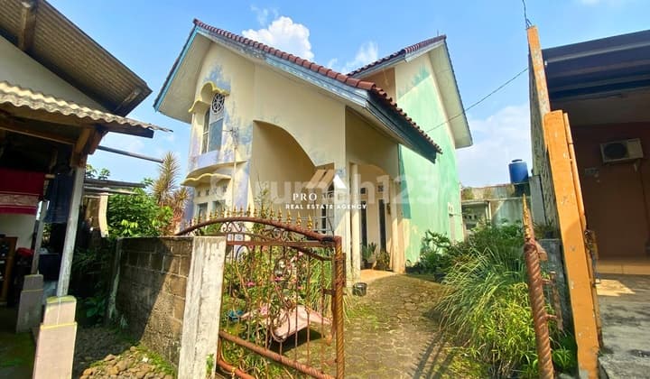 Rumah 2 Lantai Type Mezanine Berlokasi di Kp. Sidamukti Depok