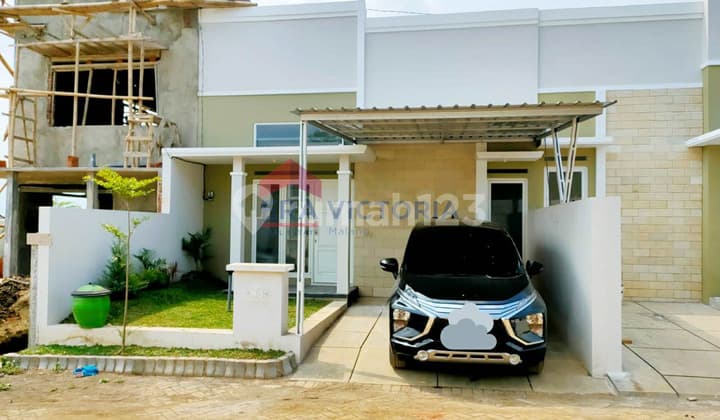 Tinggal Nyaman di Rumah Asri, Dekat Exit Tol Sawojajar & Suasana Sejuk