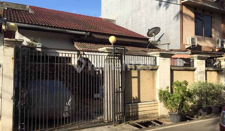 House in Front of Complex Park in Johar Baru, Central Jakarta