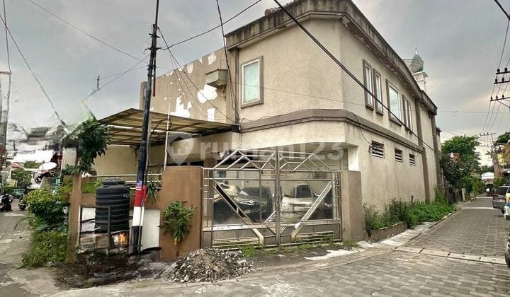 Ketabang Ngemplak House, 2-Story Tile Roof, Corner Position with Garage