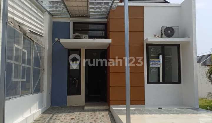 Rumah minimalis Cluster Bali Resort 1 lantai 3 kamar tidur luas 138 meter nyaman fasilitas kolam renang di perumahan Bogor , Jabar