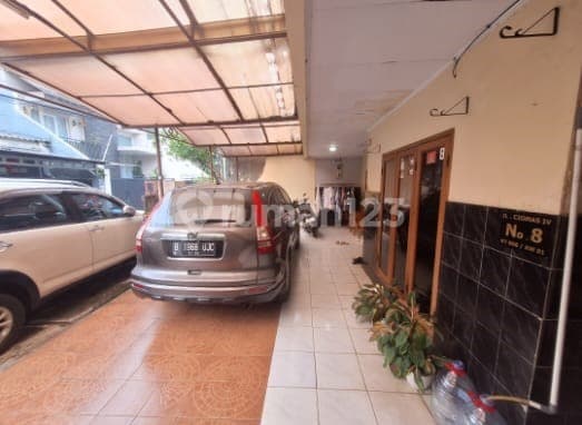 Residential House with Boarding Rooms in Ciomas, Kebayoran Baru, Accessible by Two Cars