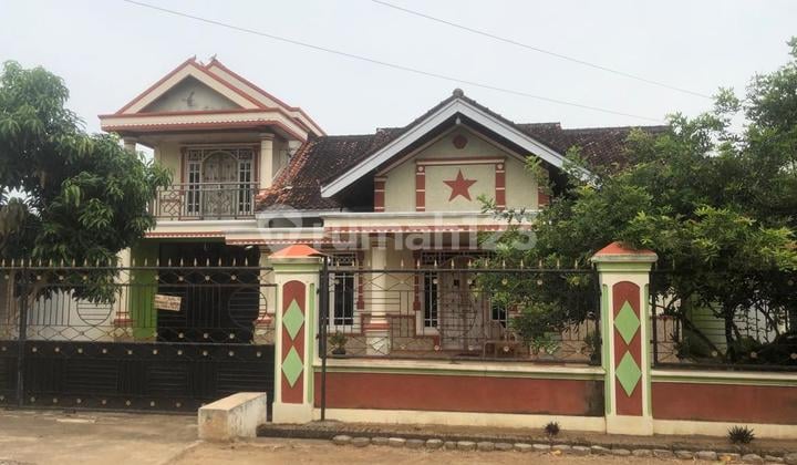 Two-story house on Desa Kibang Street, Metro Kibang Subdistrict, Lampung.
