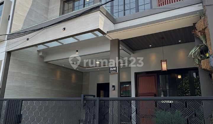 Rumah dengan rooftop 2 lantai siap huni di Pondok Cabe