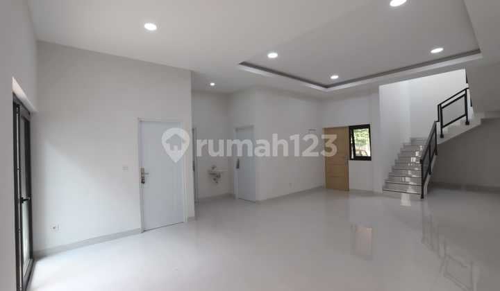Rumah modern 2 lantai siap huni dalam komplek di Graha Raya aten