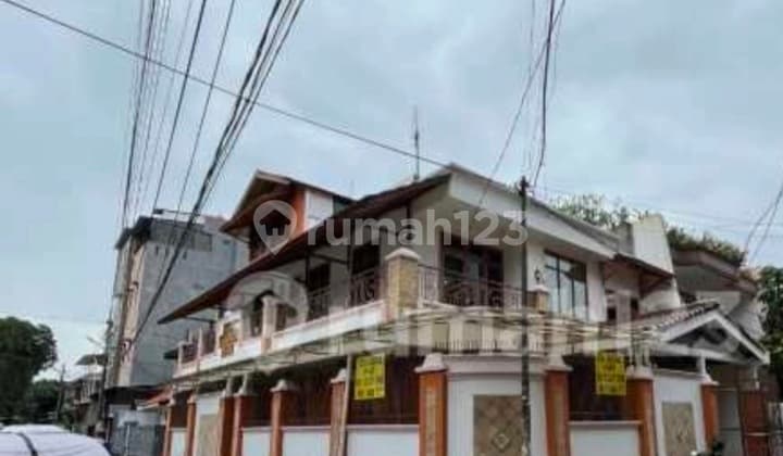 Large House Positioned on the Corner, Facing the Sports Field