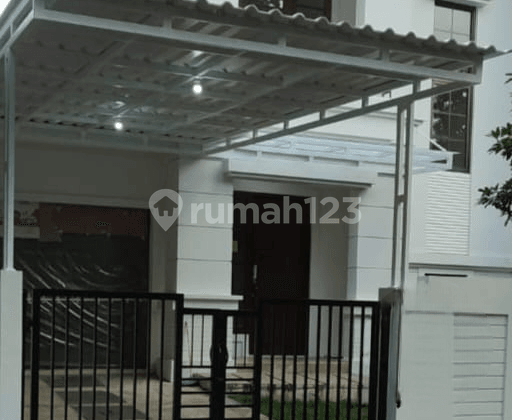 Rumah Bergaya Minimalist Modern di BSD Delatinos.