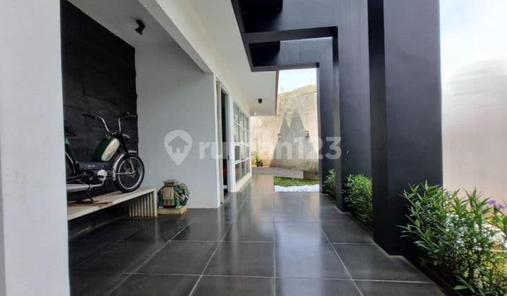 Rumah dalam cluster dengan taman belakang yg luas dibintaro sek9