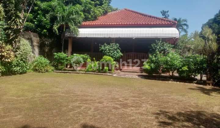 Beli Tanah Bonus Rumah di Jl Raya Hankam Pondok Gede Lebar Muka 27 Meter