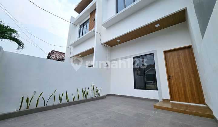 Rumah Bulevar Hijau Siap Huni di Harapan Indah Bekas