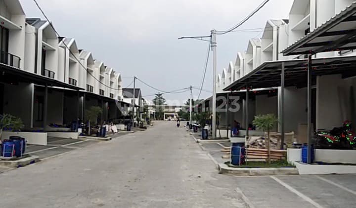DISEWAKAN RUMAH BARU 2 LANTAI SIAP HUNI DI GARDENVILLE TKI 5