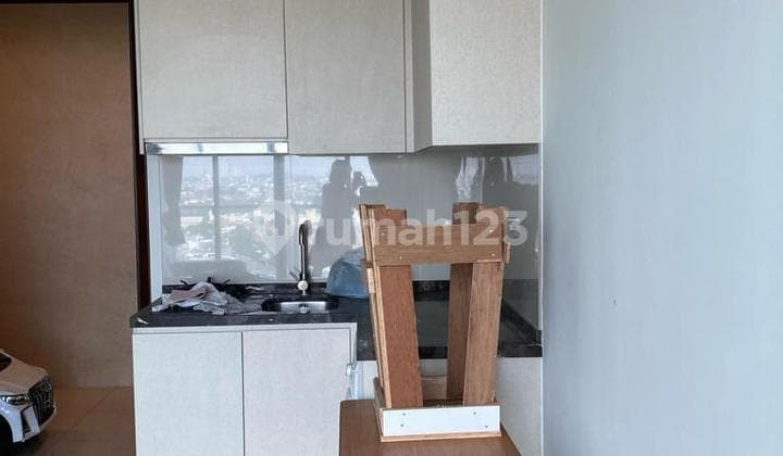 For Sale at Affordable Price, 2-Bedroom Semi-Furnished Apartment in Puri Mansion Tower A 11th Floor - Kembangan, West Jakarta.