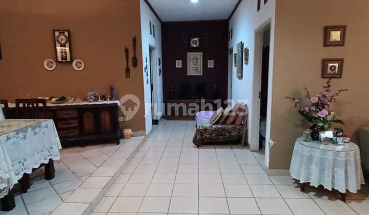 Strategic Business Land with a Spacious House in Ciawitali, Citeureup, Cimahi