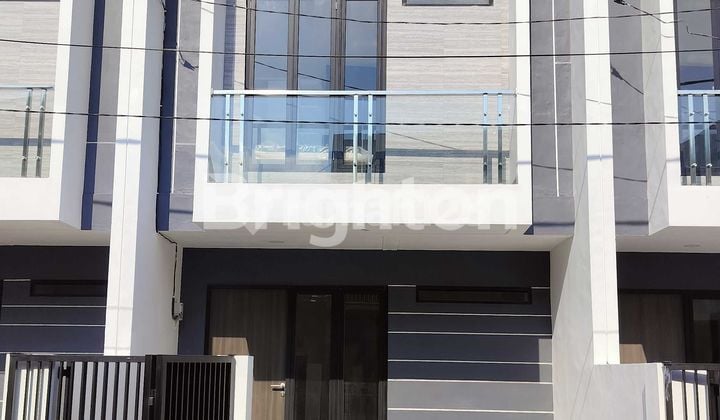 Rumah 2 lantai baru gress siap huni jalan raya oerr dekat kampus UPN Gununganyar Wiguna Purimas Rungkut Surabaya
