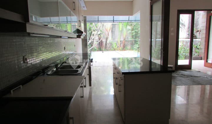 A 2 Storey, 5 Bedroom, Stand Alone House Located In Kemang Selatan, Jakarta With 5 Bathrooms, A Pool And A Yard.