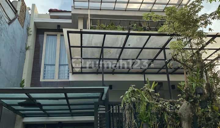 Ready-to-Occupy House in Pakuwon Indah Villa Valensia, Semi-Furnished
