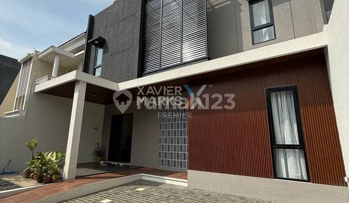 Rumah Design Modern Tropis di Cluster Golf Kota Araya Malang