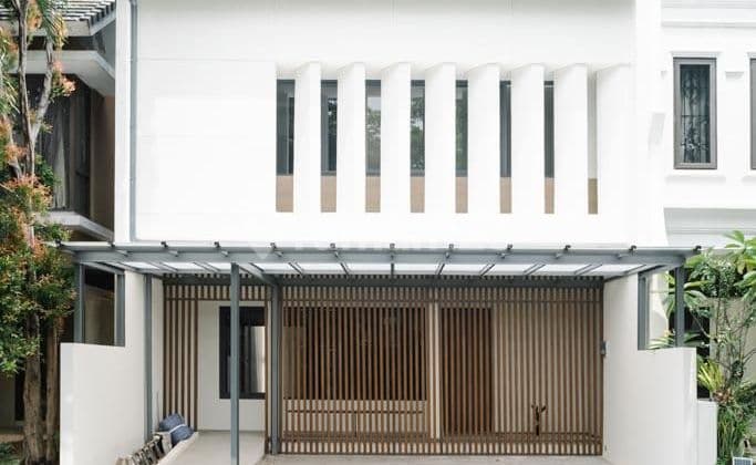 Rumah Modern Industrial Depan Taman Cluster Discovery Residence