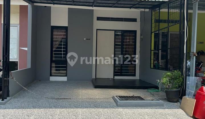 Rumah Minimalis Bebas Banjir, di Liverpool Mutiara Gading City