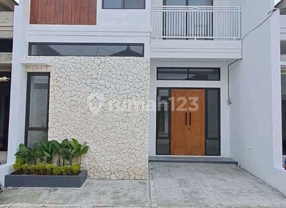 Rumah Cluster 2 Lantai Gaya Bali Di Jatijajar Depok