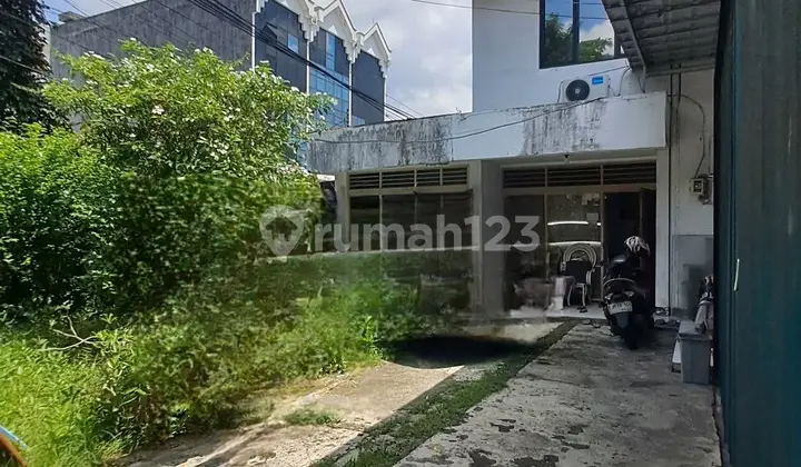 FOR SALE. Commercial area house in East Balai Pustaka, Rawamangun. Front road fits 4 cars, freehold title. Price IDR 10 billion negotiable.