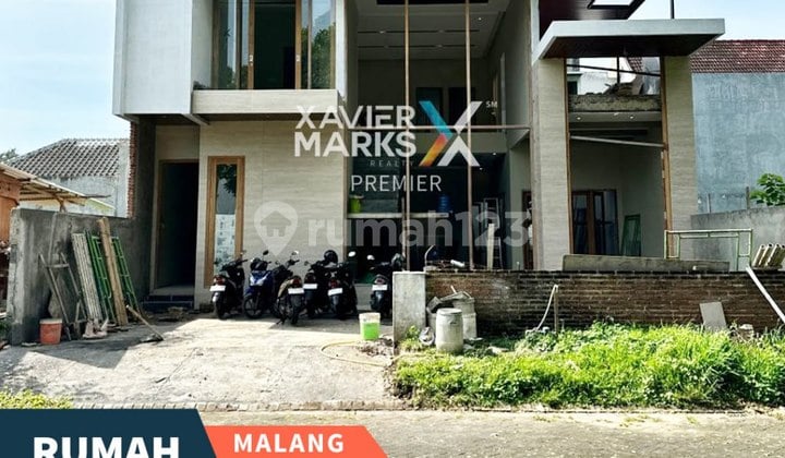 Dijual Rumah On Progres High Ceiling di Araya Golf Malang