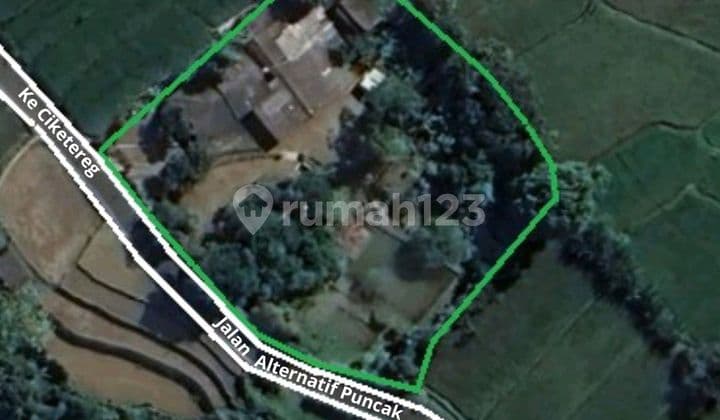 Tanah dengan Rumah di Areal Persawahan