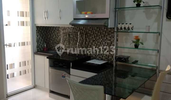 Apartemen Green Pramuka City Type 1 BR Dgn Luas 2 Kamar 33mtr Kamar Anak di Jebol Jd Ruang Tv