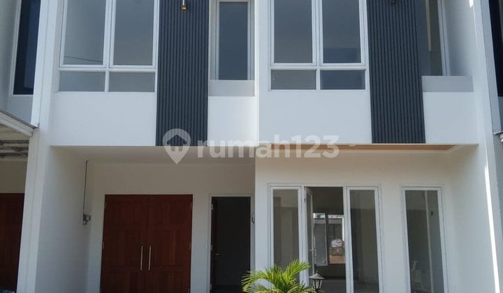 Rumah Batu Tulis Pesona Alam di Tengah Kota