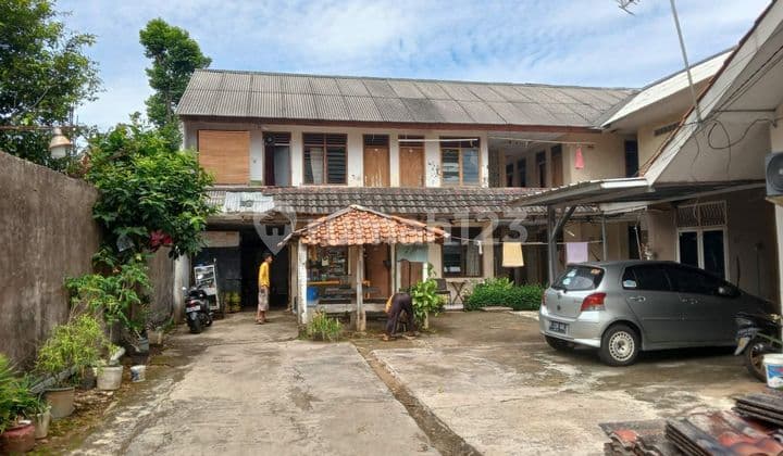 RUMAH TUA YANG STRATEGIS DISAMPING TOL KUKUSAN BEJI DEPOK