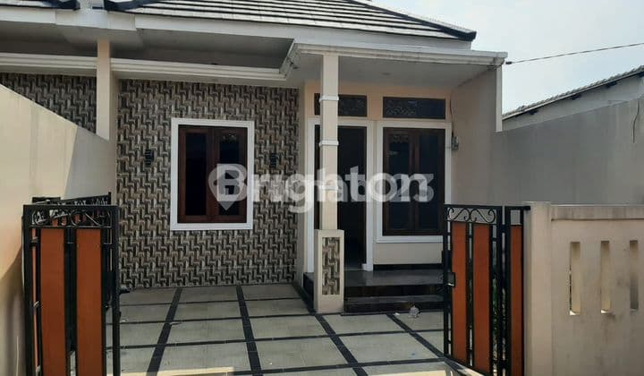 Rumah 1,5 lantai siap huni di daerah tole iskandar Depok