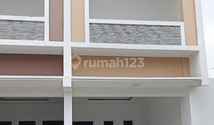 Dijual rumah 2 unit gandeng, baru direnovasi di Perumnas 1