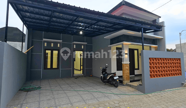 2-Car Carport House in a Housing Estate Near Maguwoharjo Stadium, Jogja