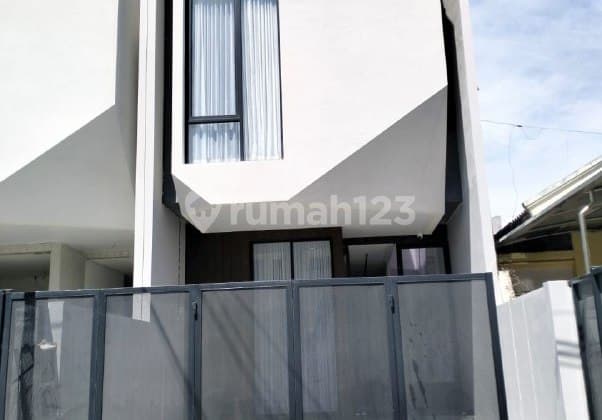 New 2-Story Semi-Furnished House with SHM in Sutorejo, Near Pakuwon City.