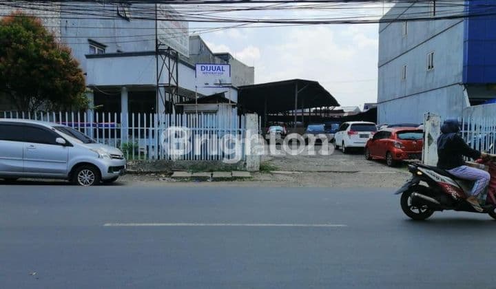 TANAH DAN BANGUNAN LOKASI SANGAT STRATEGIS DI JALAN UTAMA PAHLAWAN REVOLUSI PONDOK BAMBU