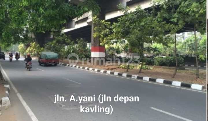 TANAH LOKASI STRATEGIS di Jln. A.YANI,Jaktim,sebelahan UT,akses toll,harga sgt reasonable,lebar muka 60m