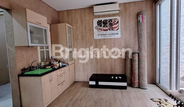 RUMAH SIAP HUNI DALAM CLUSTER KOTA WISATA CIBUBUR