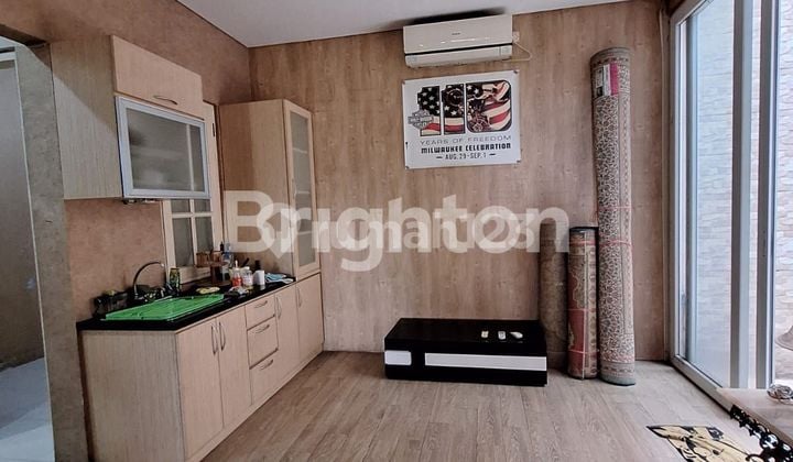 RUMAH SIAP HUNI DALAM CLUSTER KOTA WISATA CIBUBUR