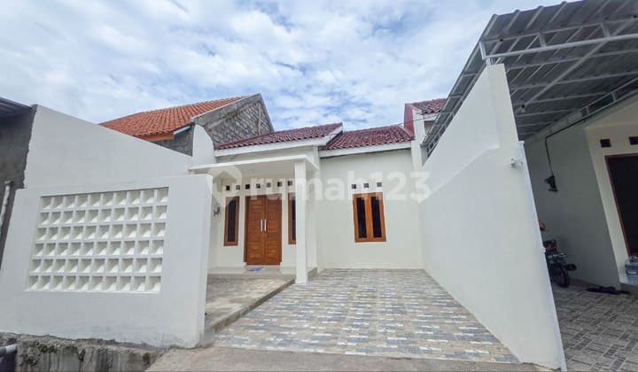 Rumah Progres Pagar Canopy Tengah Kota Sumber