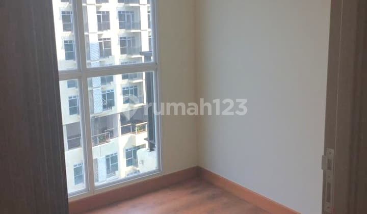 For Sale Puri Orchard Apartment Semi Furnished, Area 50, 2 Bedrooms 2 Bathrooms, Equipped with 2 ACs, Water Heater, Single Bed, Wooden Wardrobe, Strategic Location Jorr, Soetta Airport.