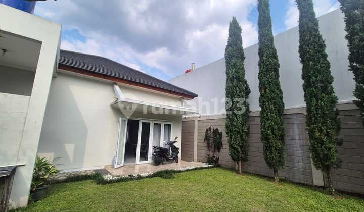 Rumah Minimalis dengan Taman Belakang Elegan di Geger Kalong