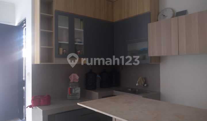 Rumah 2 Lantai Parkir Luas di Suvarna Cluster Flavio
