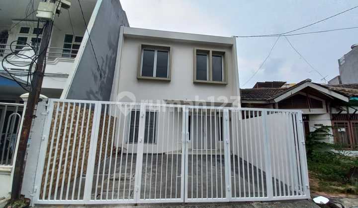 Rumah Depan Taman Bagus di Taman Surya 2 Cengkareng Jakarta Barat