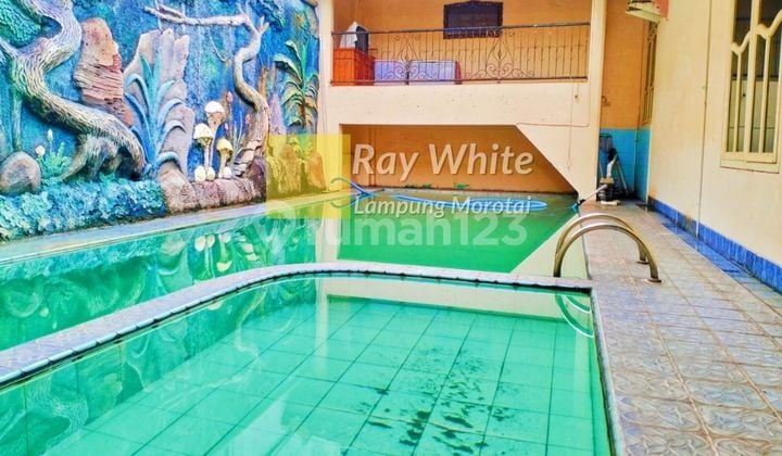 Rumah bebas banjir ada kolam renang lokasi pahoman