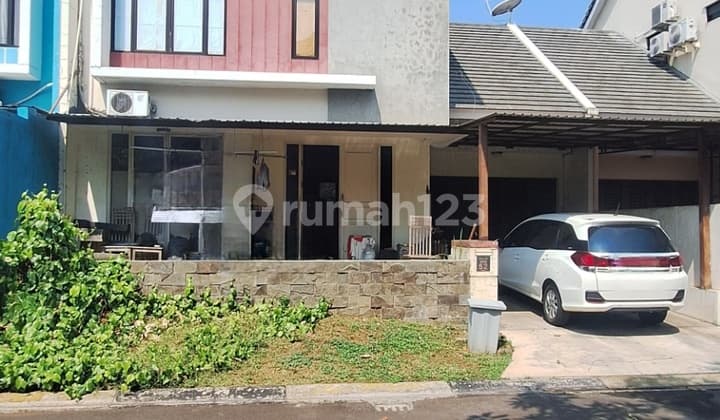 Rumah 2 lantai 4+1 kamar dekat tol di Graha Raya