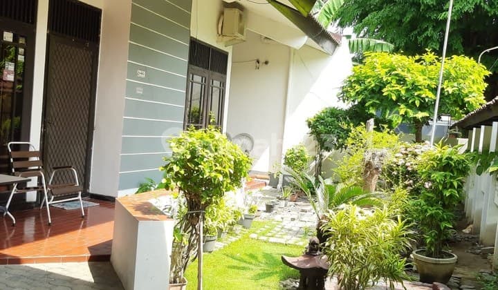 SINGLE STORY HOUSE IN MANYAR JAYA AREA SURABAYA NEGOTIABLE FRONTING ROAD FOR 3 CARS