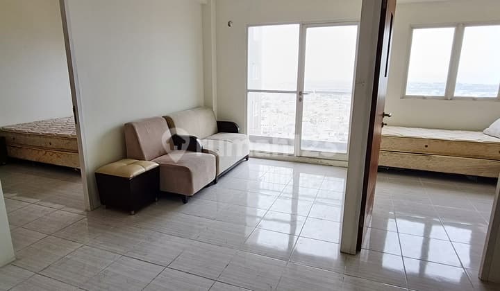 Rent 2 Bedroom Semi-Furnished Apartment Puncak Dharmahusad
