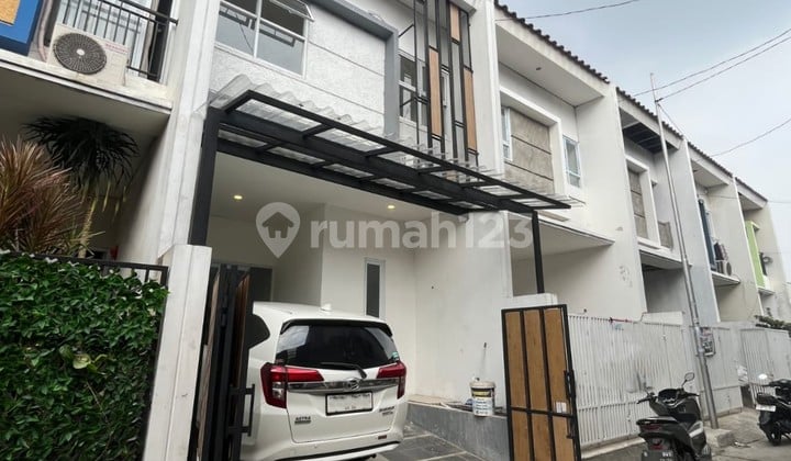 New, ready-to-occupy house on H. Nimin Street, Rawa Buaya, 086BUD